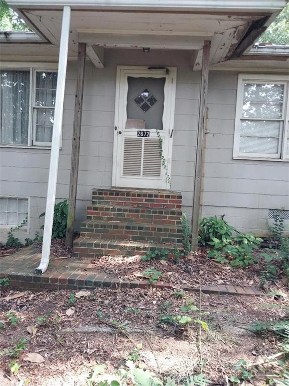 2672 Roswell Road Marietta, GA 30062 - Photo 4 of 17 a view of a house with a yard