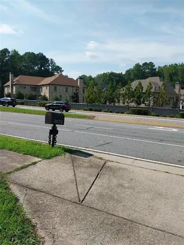 a view of backyard with seating space
