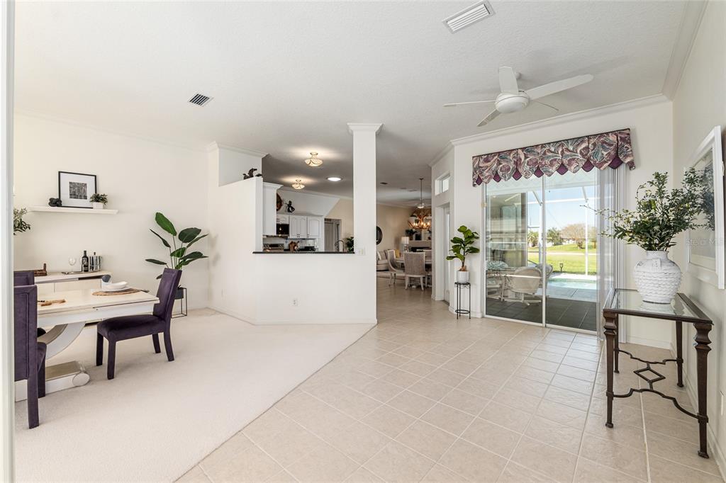 5711 Northwest 25th Loop Ocala, FL 34482 - Photo 14 of 91 a view of a livingroom with furniture and a flat screen tv