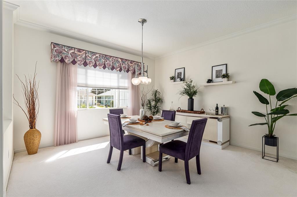 5711 Northwest 25th Loop Ocala, FL 34482 - Photo 16 of 91 a dining room with furniture and window