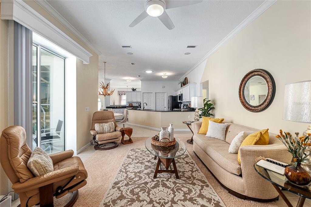 5711 Northwest 25th Loop Ocala, FL 34482 - Photo 26 of 91 a living room with furniture and a large window