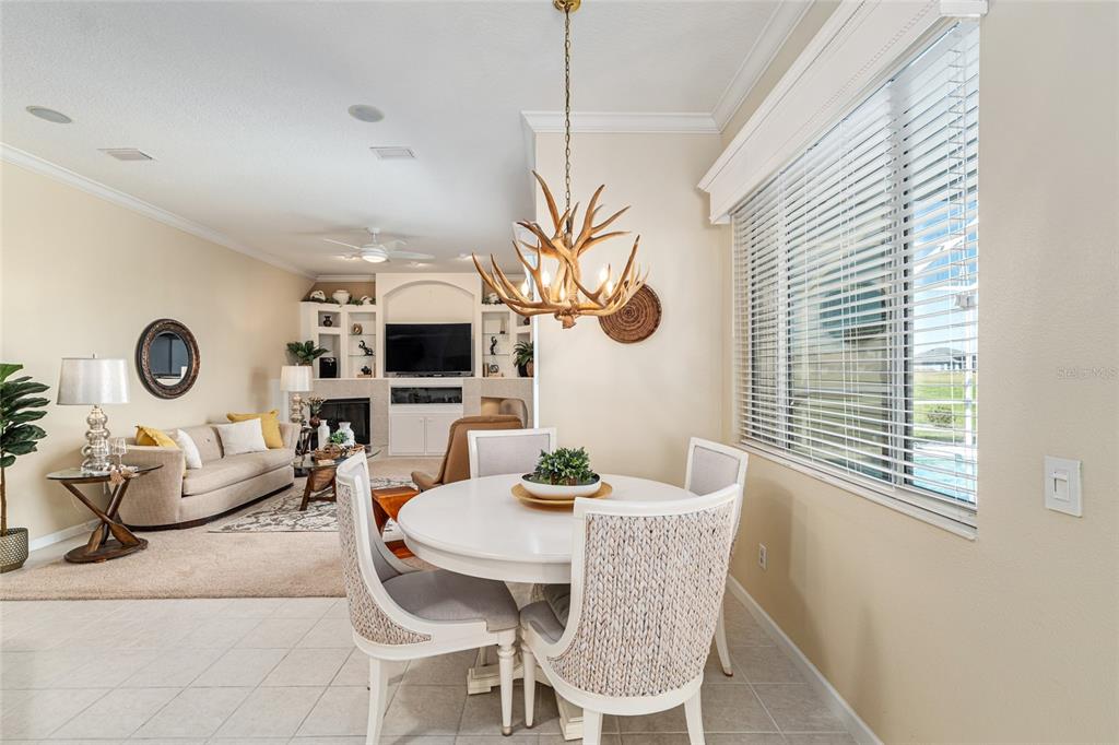 5711 Northwest 25th Loop Ocala, FL 34482 - Photo 29 of 91 a dining room with furniture and window