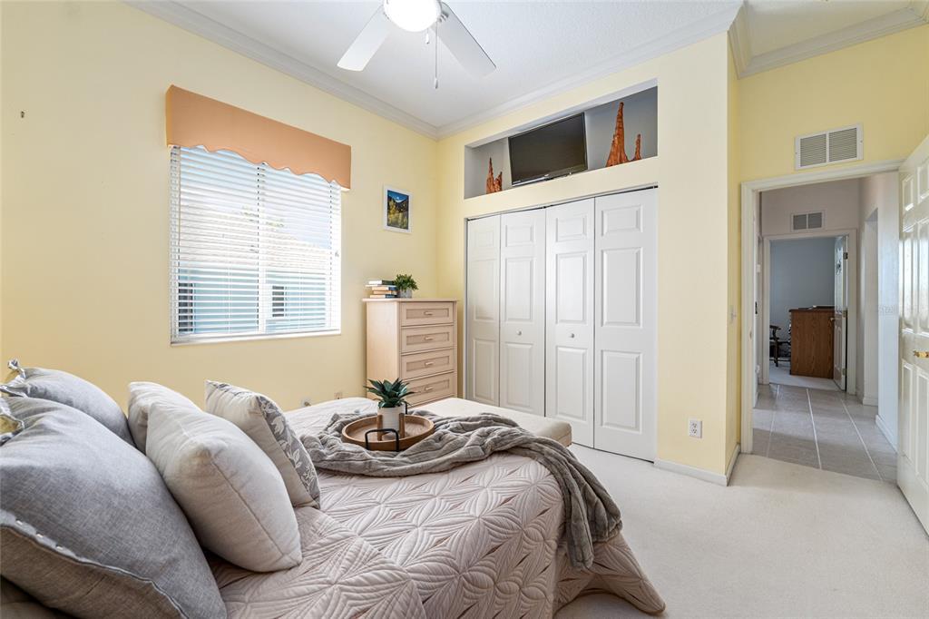 5711 Northwest 25th Loop Ocala, FL 34482 - Photo 58 of 91 a bedroom with bed and balcony