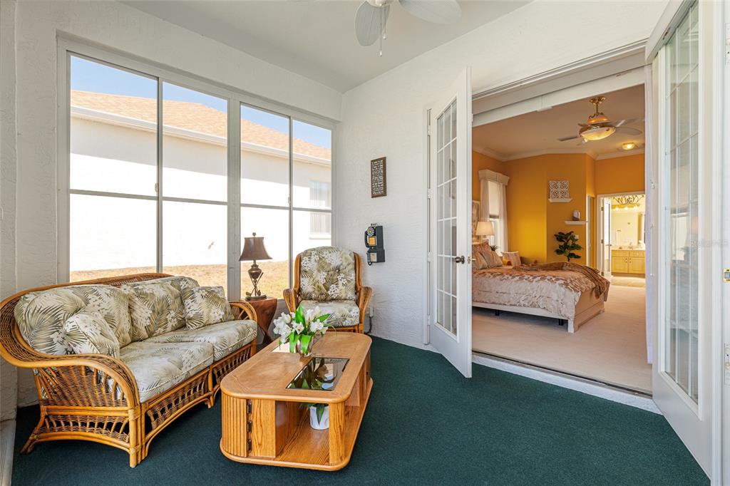 5711 Northwest 25th Loop Ocala, FL 34482 - Photo 65 of 91 a bedroom with furniture and a large window