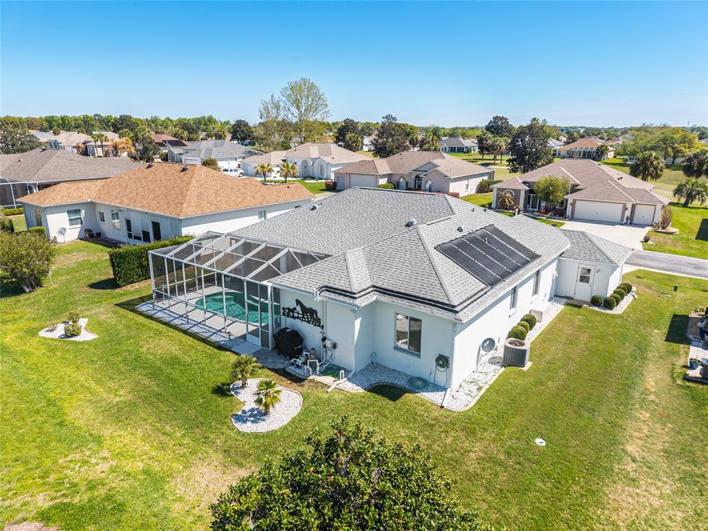 5711 Northwest 25th Loop Ocala, FL 34482 - Photo 82 of 91 an aerial view of residential houses with outdoor space and ocean view
