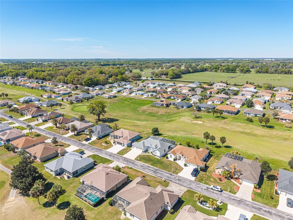 5711 Northwest 25th Loop Ocala, FL 34482 - Photo 84 of 91 an aerial view of ocean and residential houses with outdoor space