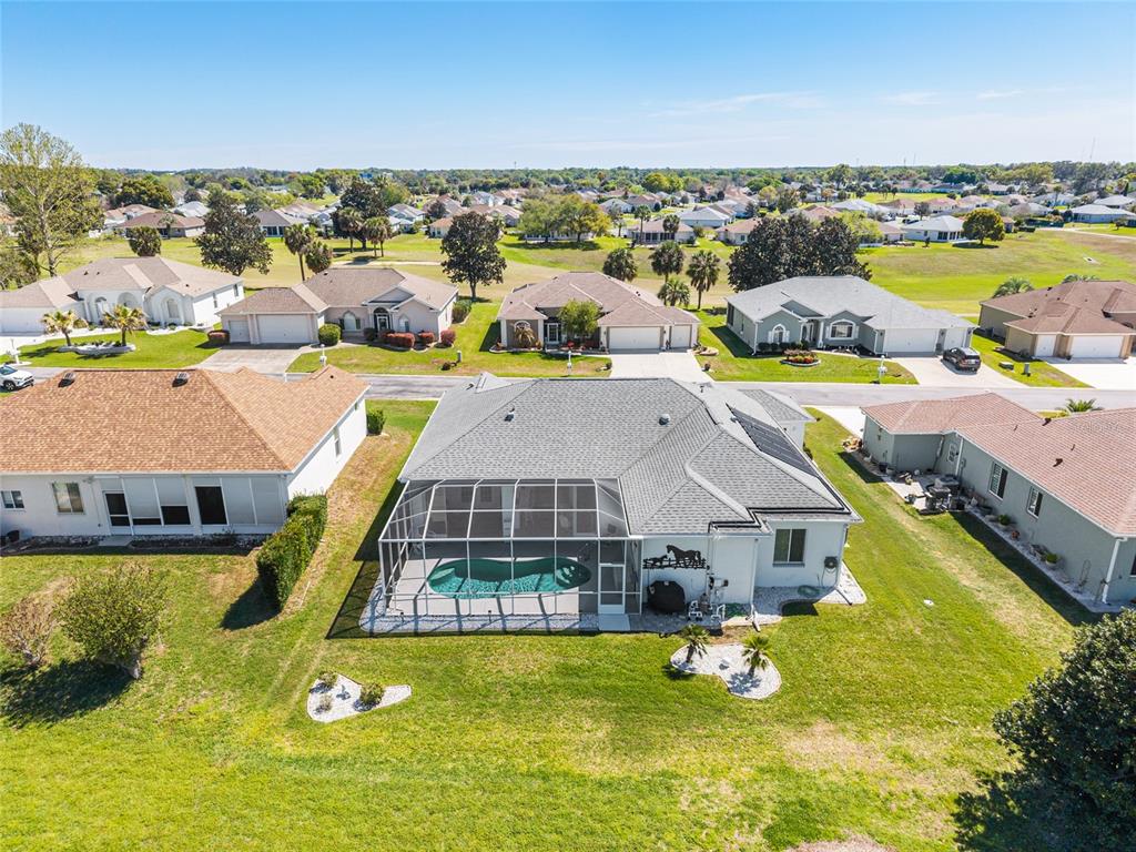5711 Northwest 25th Loop Ocala, FL 34482 - Photo 88 of 91 an aerial view of residential houses with outdoor space