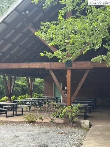 a view of a sign board with yard