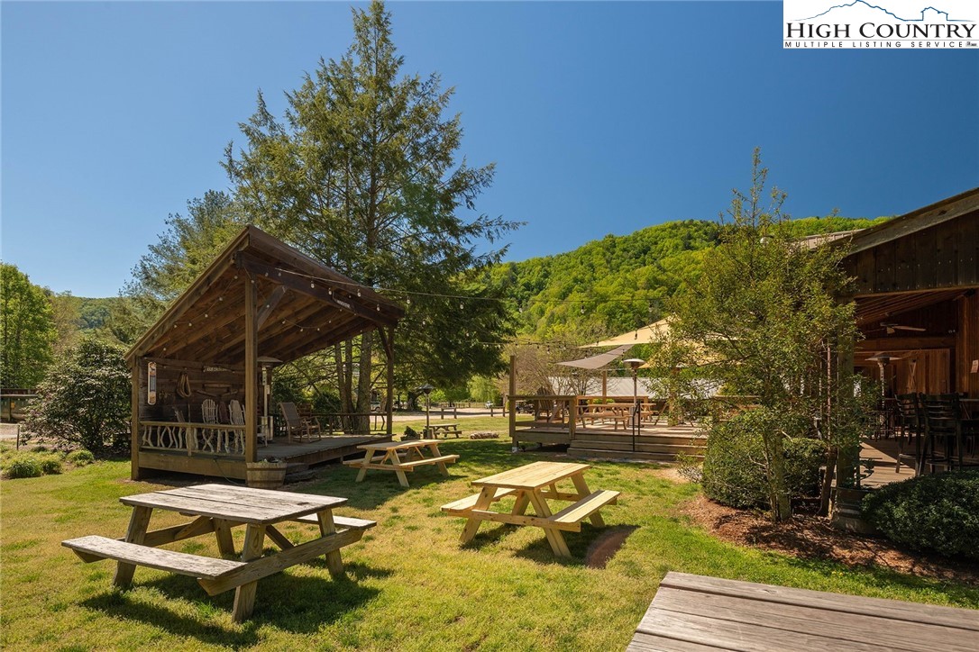 79 Elk Horn Road Ferguson, NC 28624 - Photo 19 of 21 a view of a swimming pool with lounge chairs