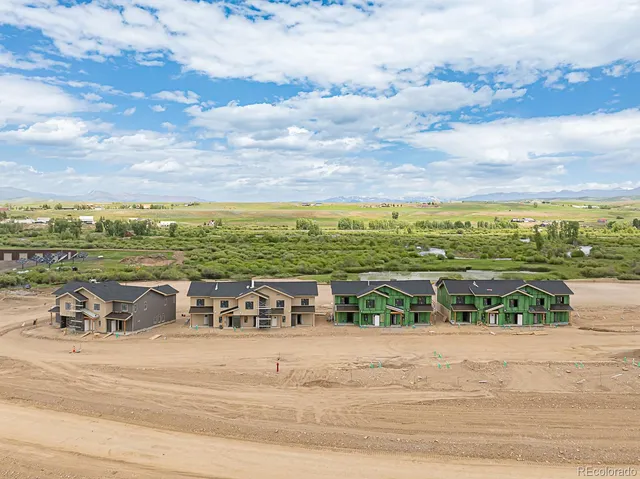 a view of a city with an ocean