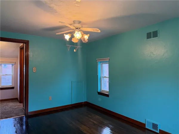 a view of a livingroom with a fan