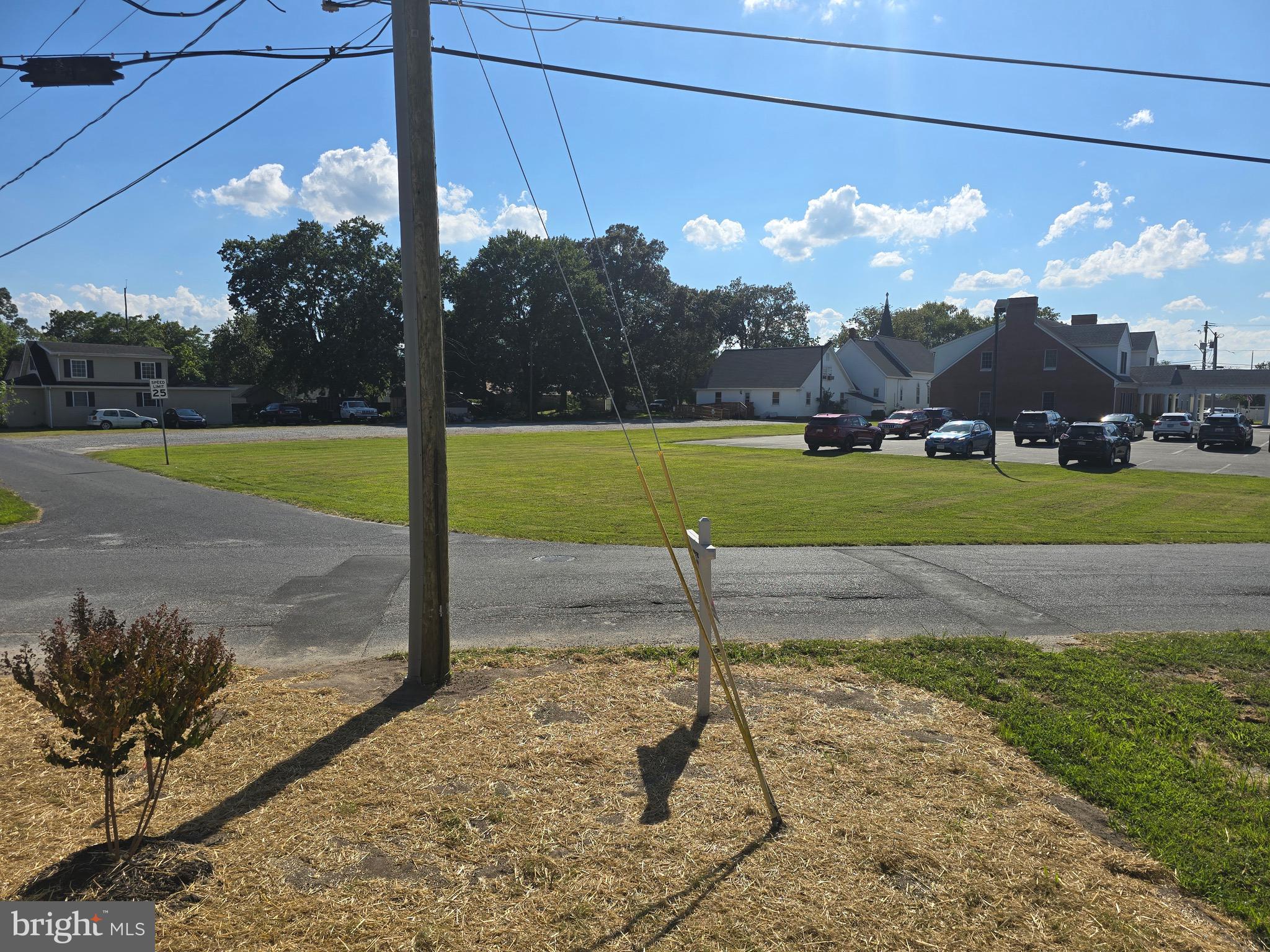 7457 Market Street Willards, MD 21874 - Photo 17 of 51 a view of a street with a yard