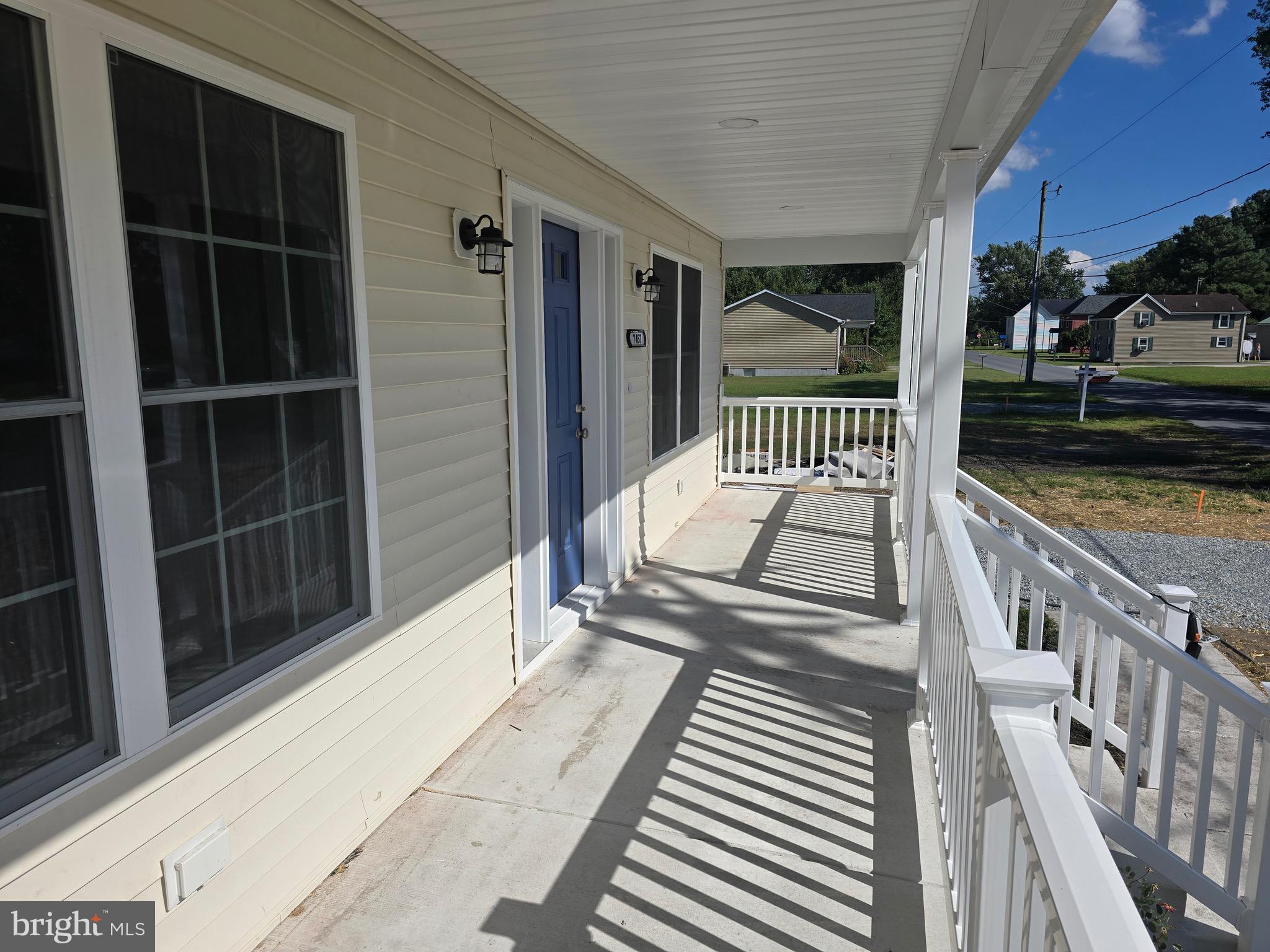 7457 Market Street Willards, MD 21874 - Photo 18 of 51 a balcony view with a outdoor seating space