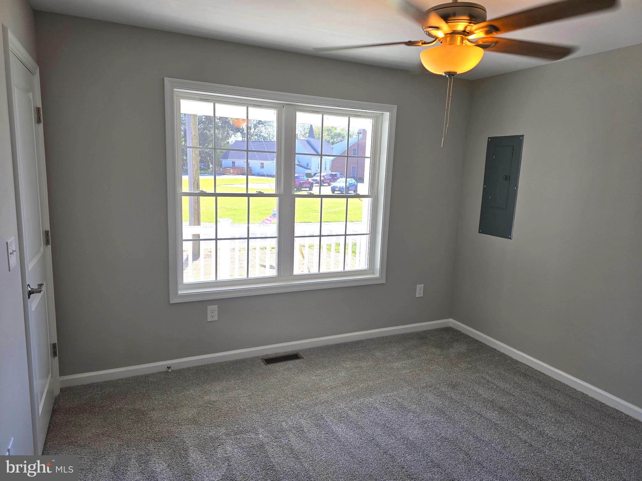 7457 Market Street Willards, MD 21874 - Photo 25 of 51 an empty room with a window