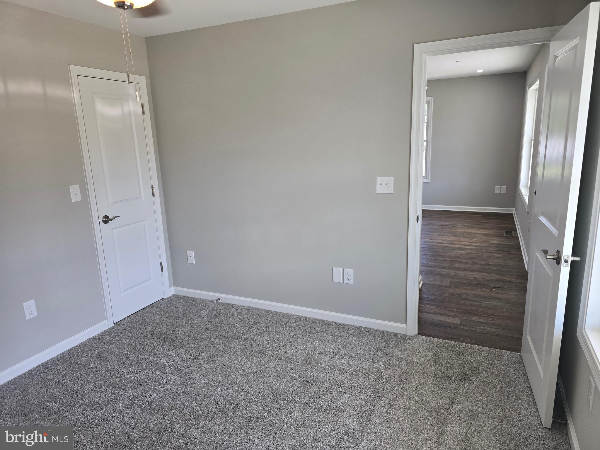 7457 Market Street Willards, MD 21874 - Photo 27 of 51 a view of an empty room with closet and mirror