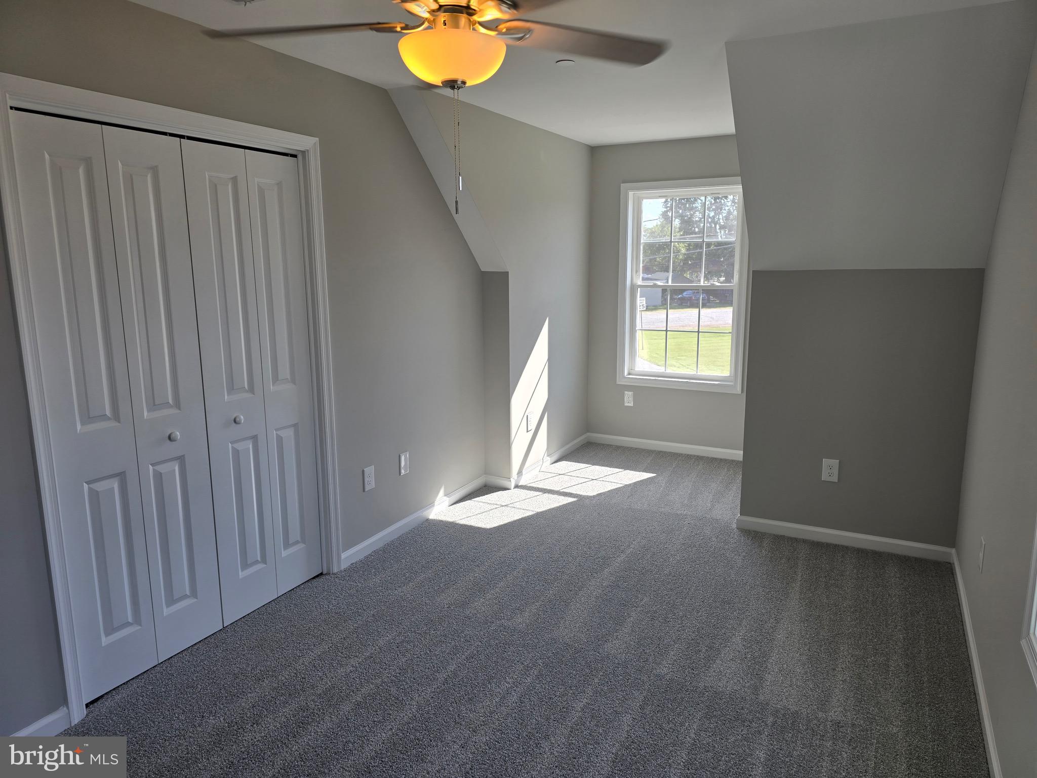 7457 Market Street Willards, MD 21874 - Photo 35 of 51 wooden floor in an empty room with a window
