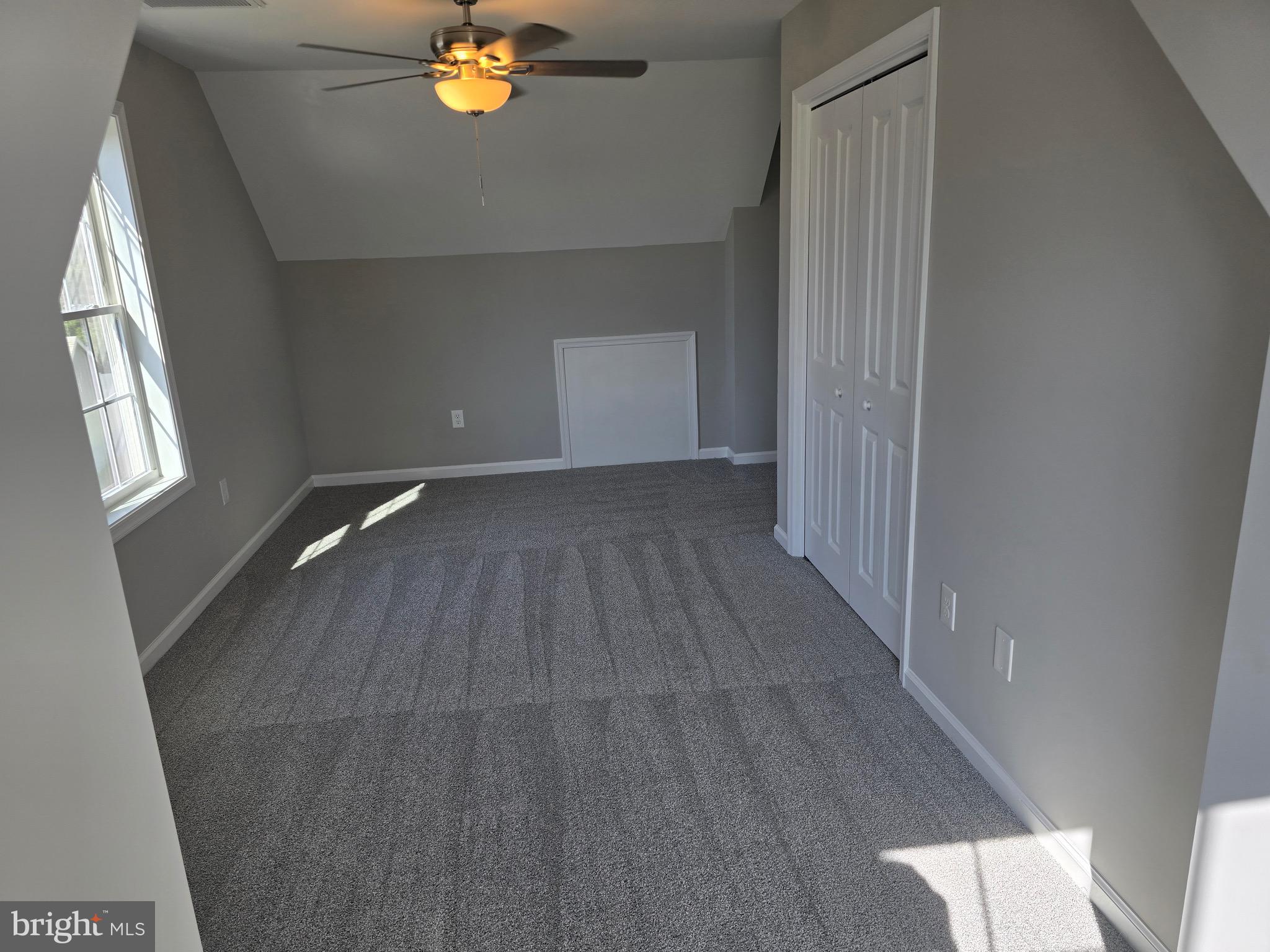 7457 Market Street Willards, MD 21874 - Photo 37 of 51 a view of empty room with window and wooden floor
