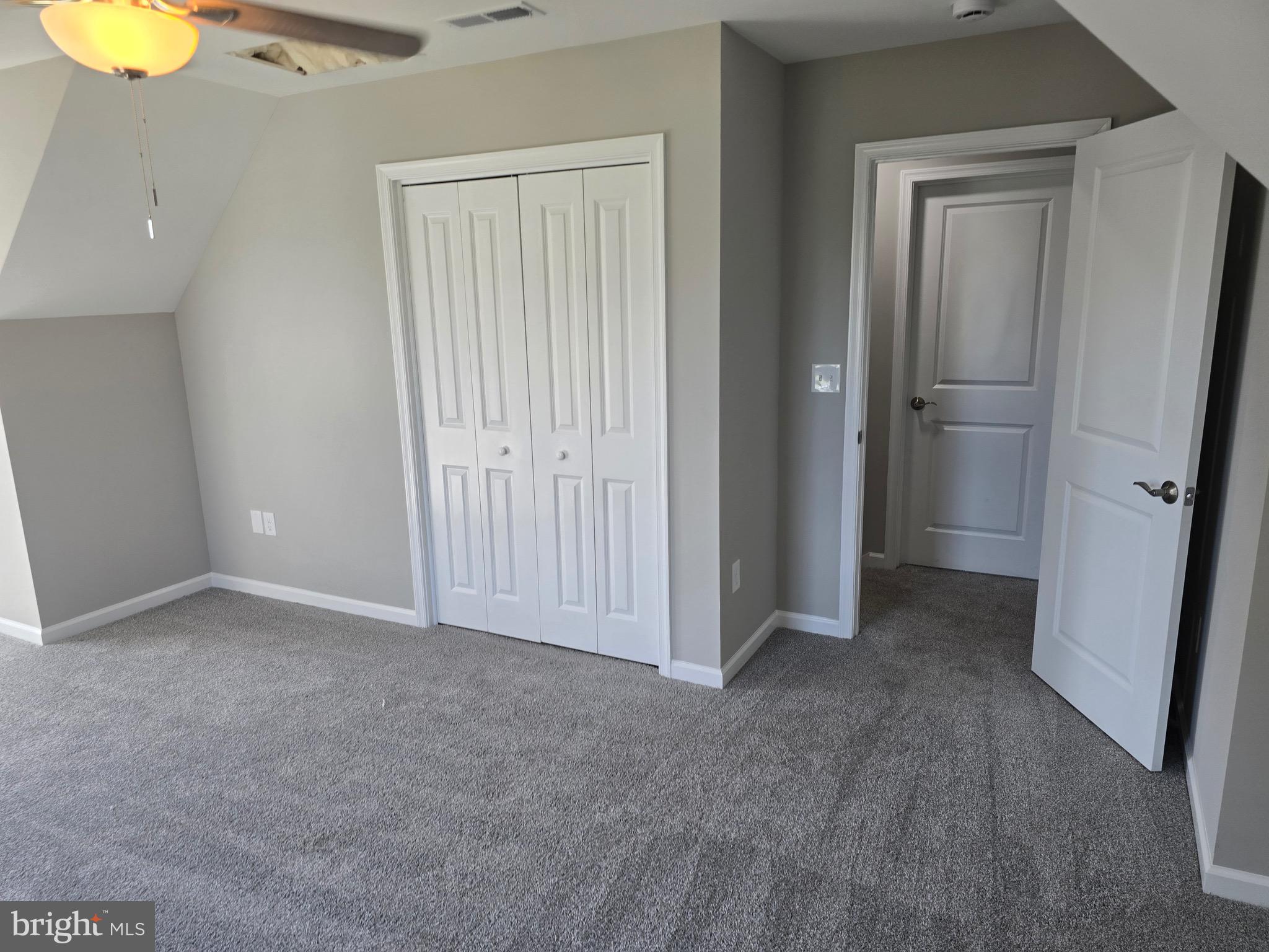 7457 Market Street Willards, MD 21874 - Photo 41 of 51 a view of an empty room with closet and mirror