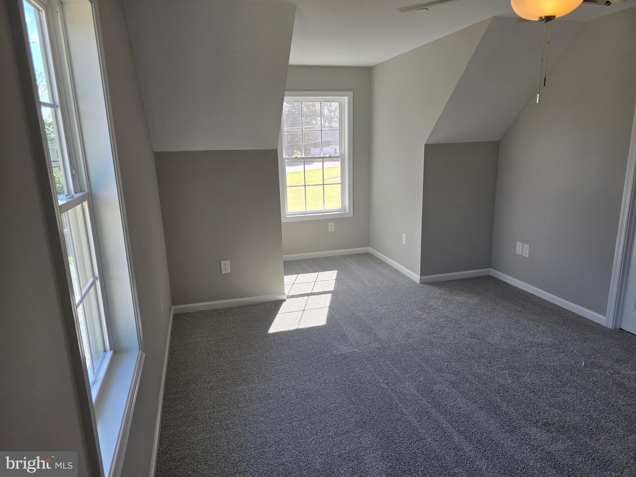 7457 Market Street Willards, MD 21874 - Photo 43 of 51 an empty room with windows