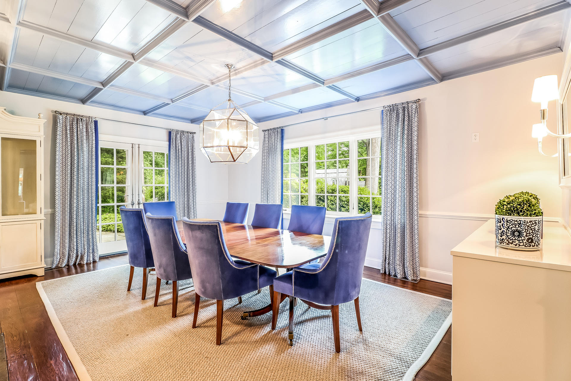 5 Hawthorne Road Darien, CT 06820 - Photo 13 of 49 a dining room with furniture a chandelier and wooden floor