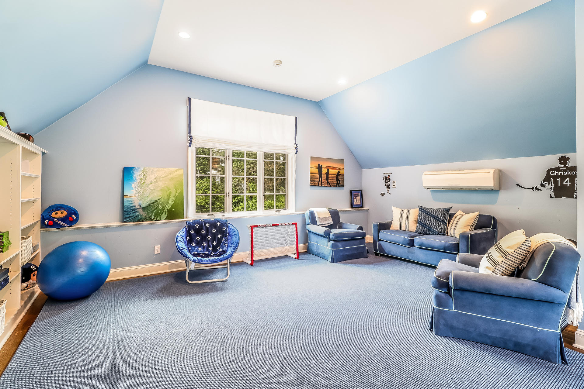 5 Hawthorne Road Darien, CT 06820 - Photo 20 of 49 a living room with furniture a window and a flat screen tv