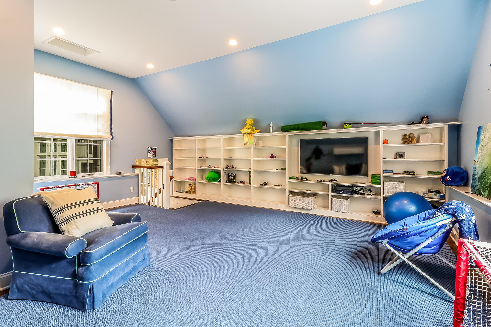 5 Hawthorne Road Darien, CT 06820 - Photo 21 of 49 a living room with furniture and a flat screen tv