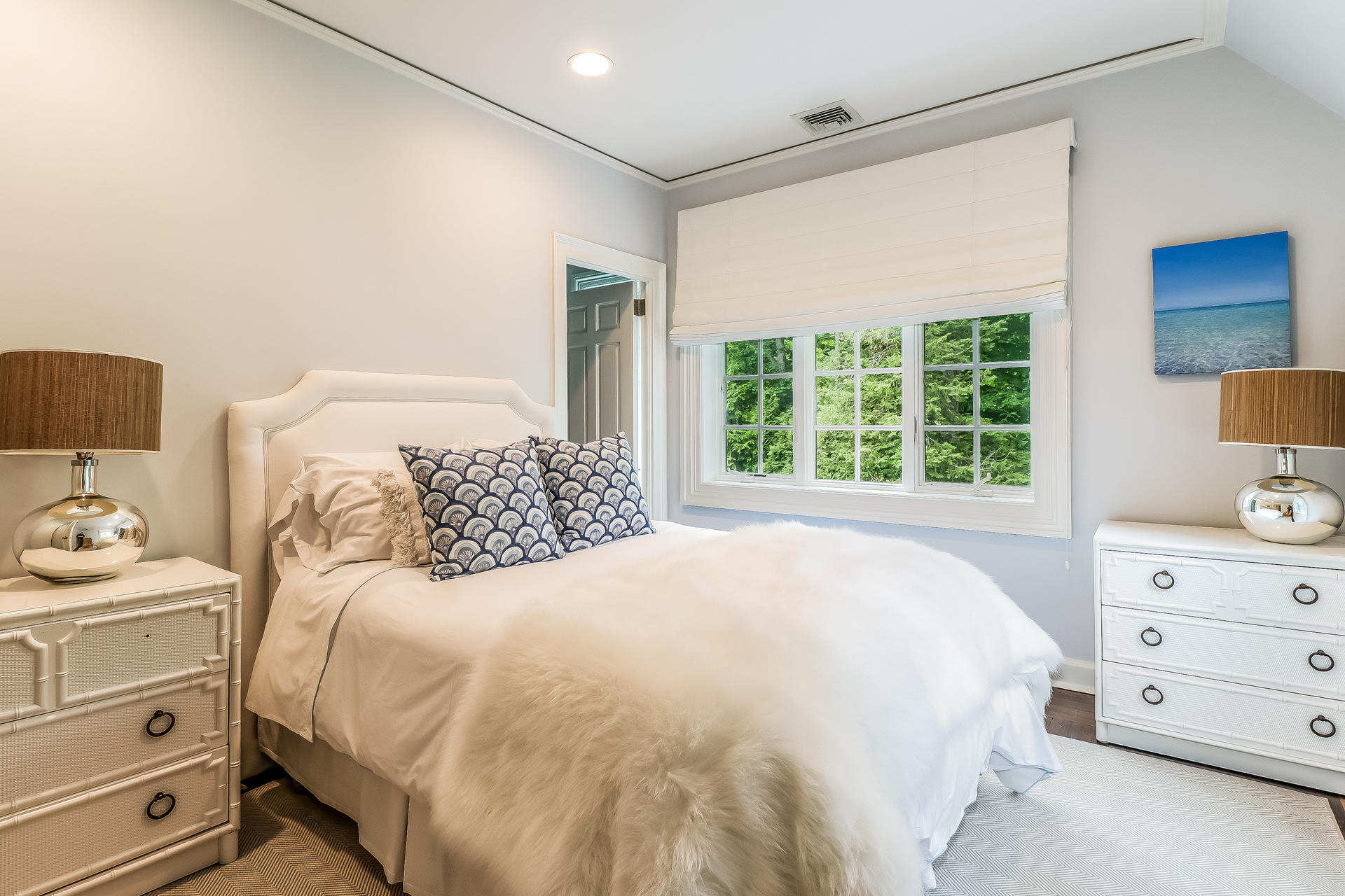 5 Hawthorne Road Darien, CT 06820 - Photo 26 of 49 a bedroom with a bed and a window