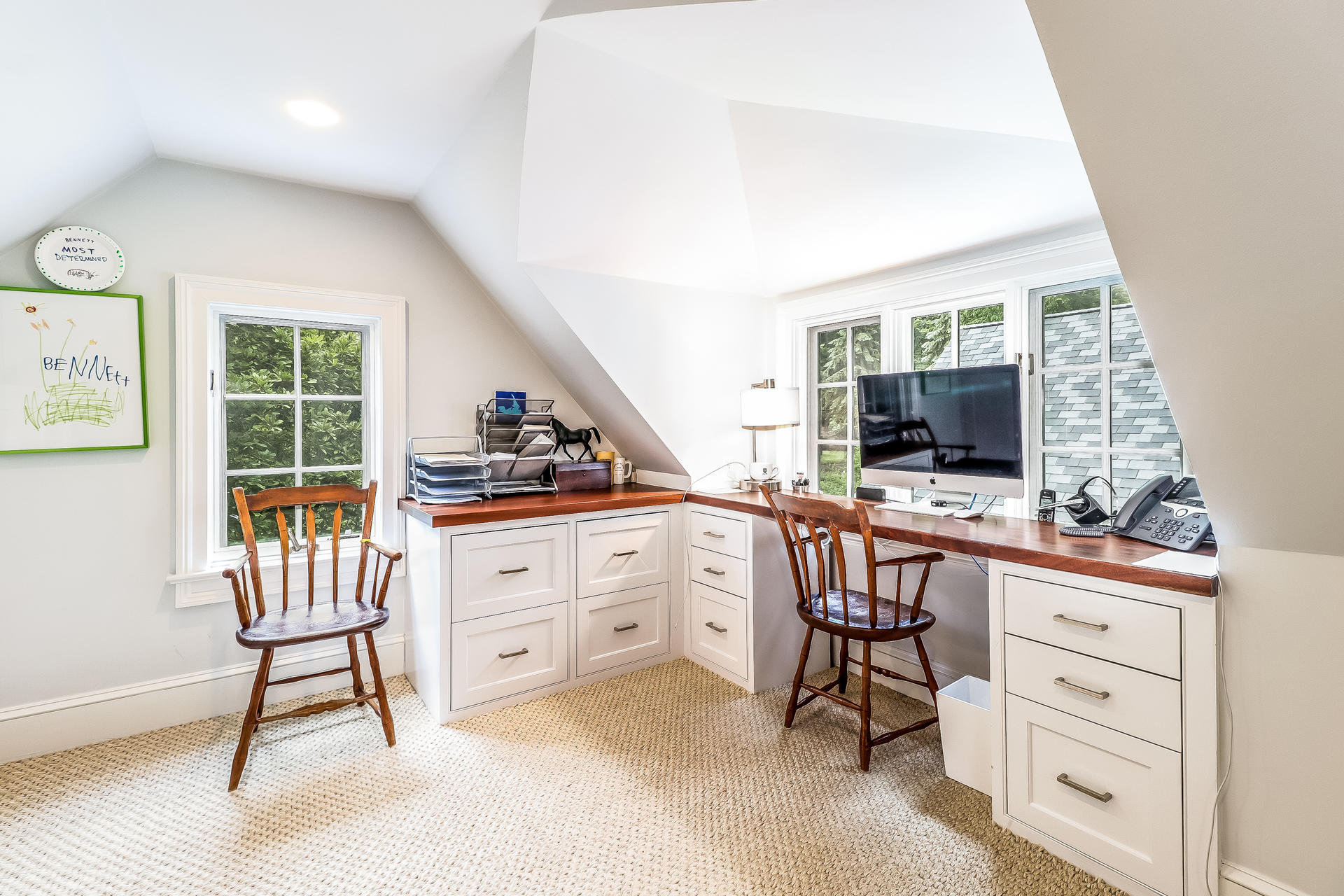 5 Hawthorne Road Darien, CT 06820 - Photo 32 of 49 a kitchen with white cabinets and chairs