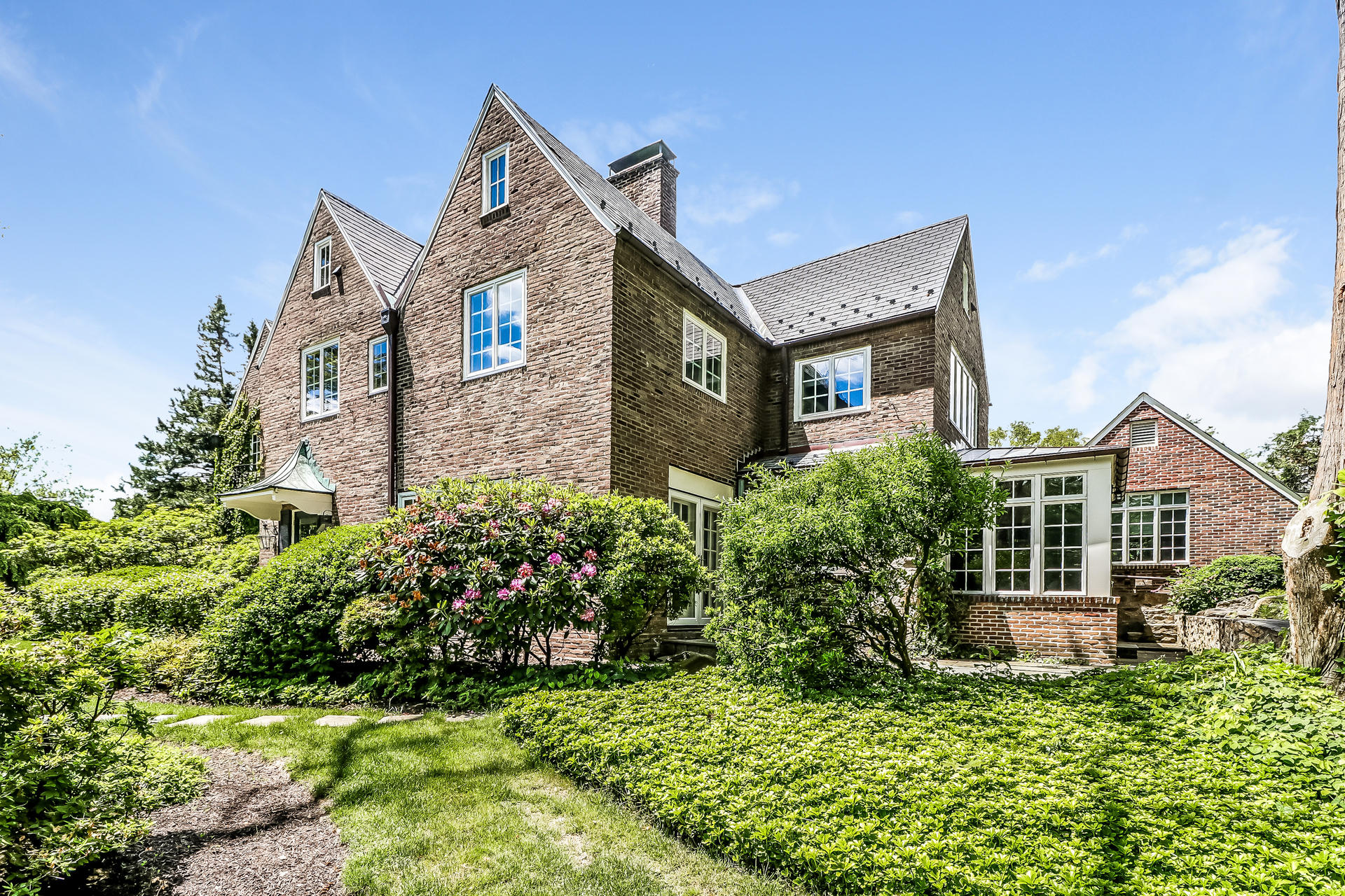 5 Hawthorne Road Darien, CT 06820 - Photo 34 of 49 a front view of a house with a yard