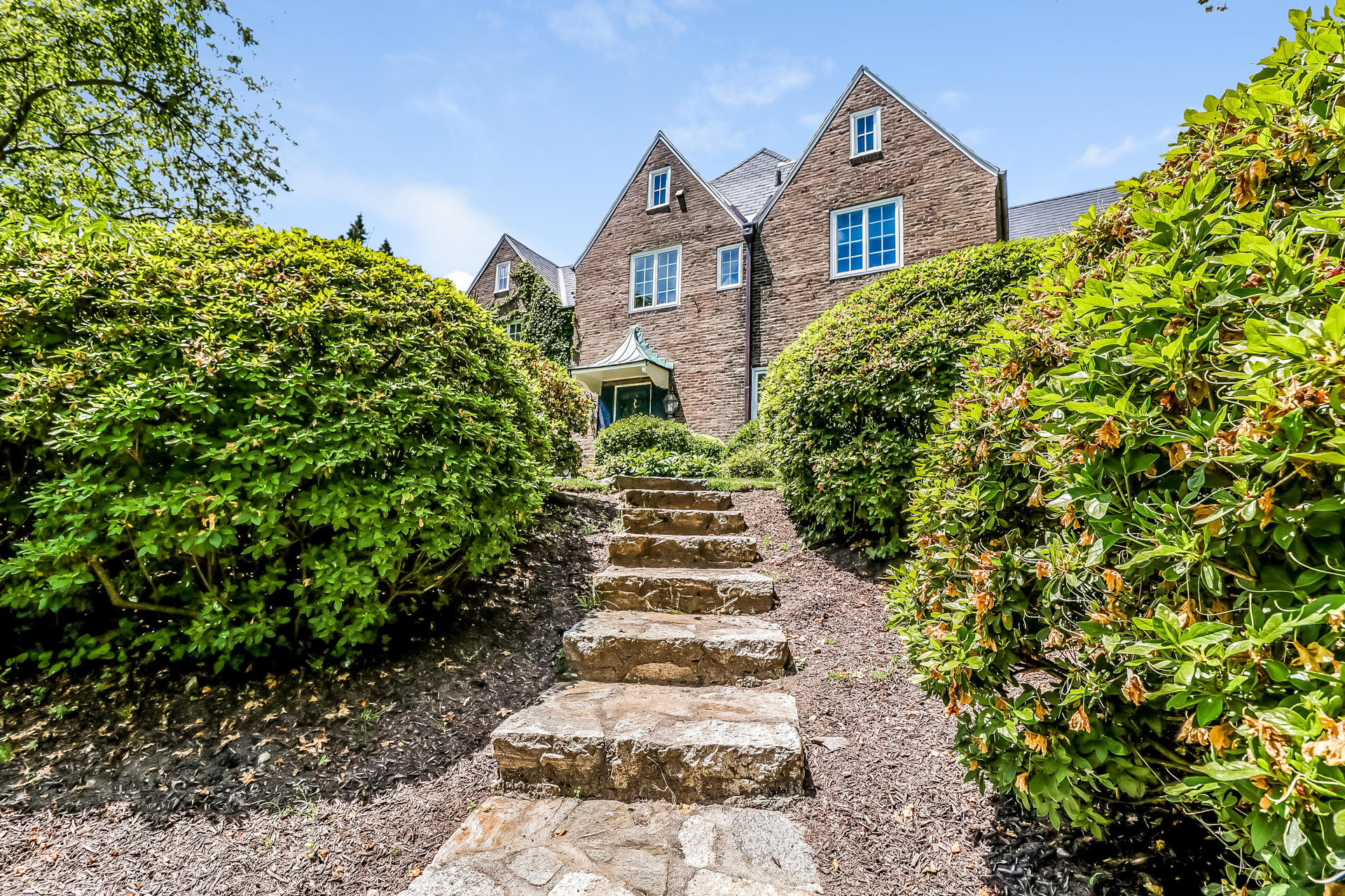 5 Hawthorne Road Darien, CT 06820 - Photo 36 of 49 a front view of a house with a yard
