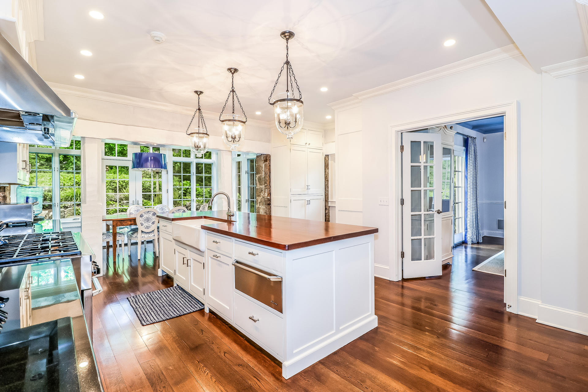 5 Hawthorne Road Darien, CT 06820 - Photo 6 of 49 a kitchen with stainless steel appliances granite countertop a stove and a wooden floors