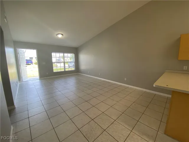 a view of an empty room and window