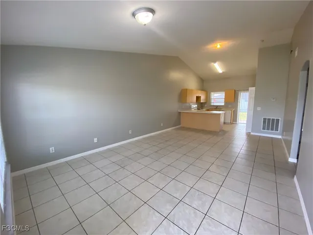 a kitchen with a cabinets and appliances