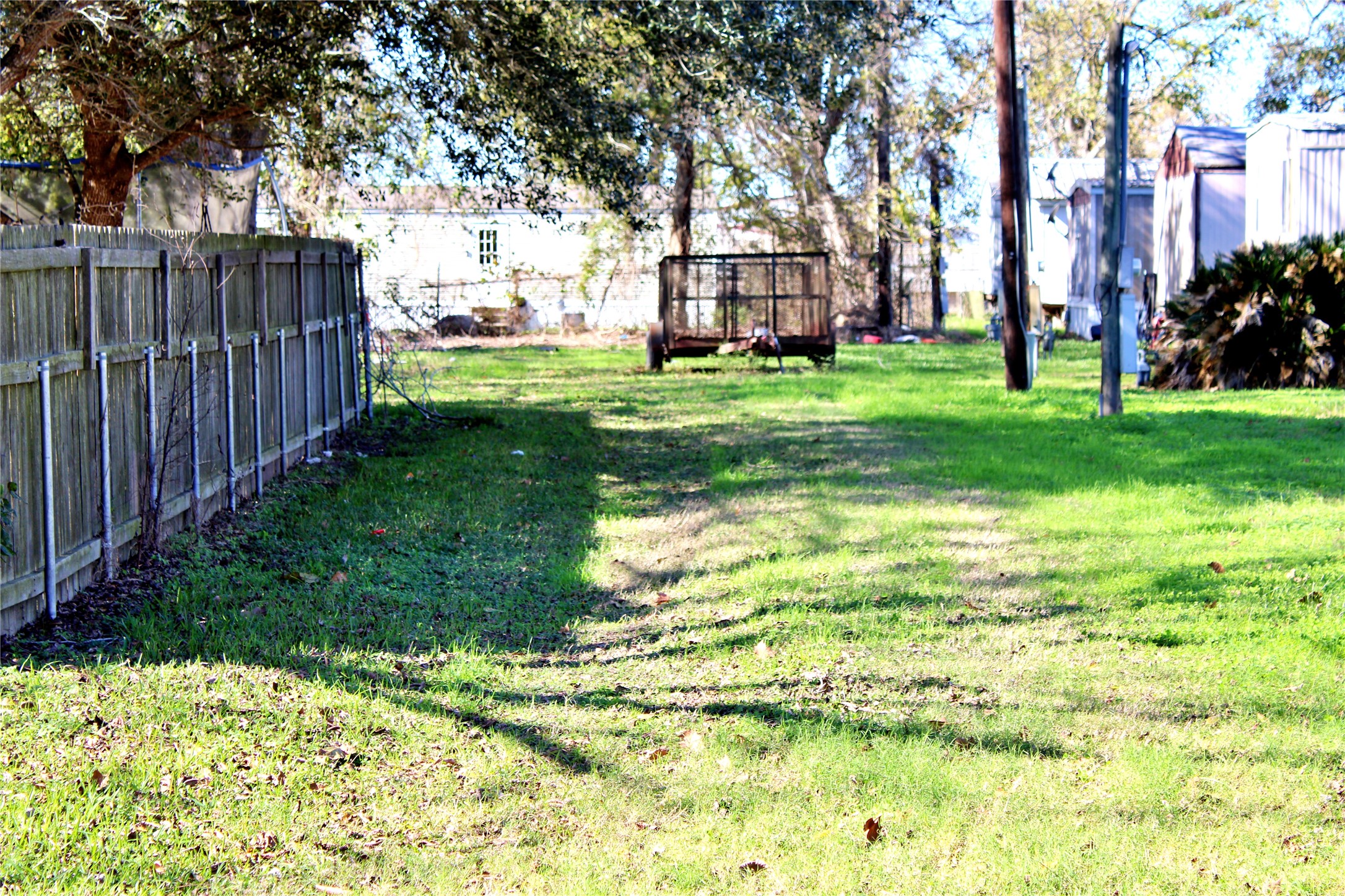 628 Austin Street Columbus, TX 78934 - Photo 2 of 8 a view of a park with large trees