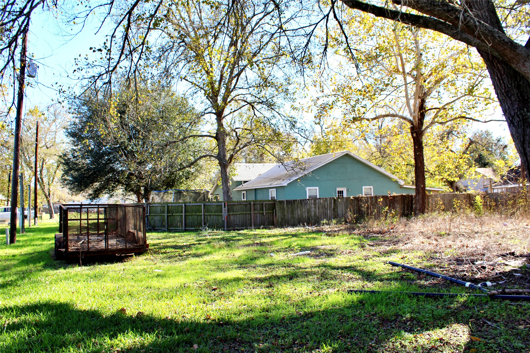 628 Austin Street Columbus, TX 78934 - Photo 4 of 8 a view of house with a yard