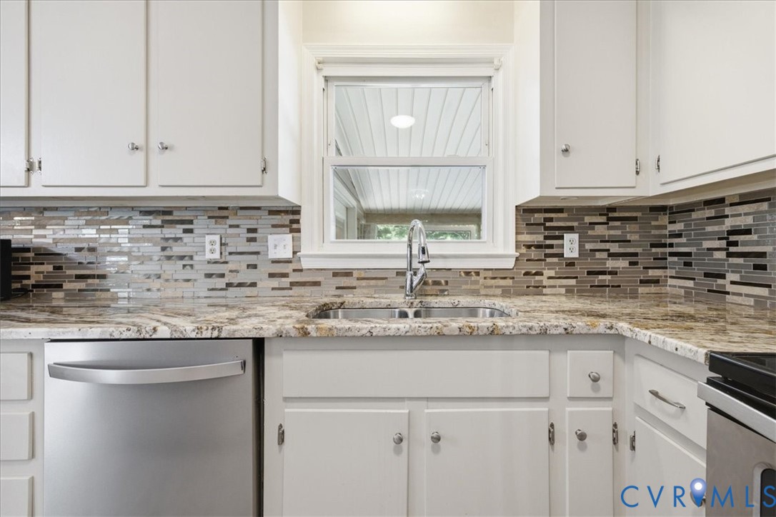 404 Bermuda Hundred Road Chester, VA 23836 - Photo 10 of 37 Kitchen featuring white cabinetry, a dual basin st