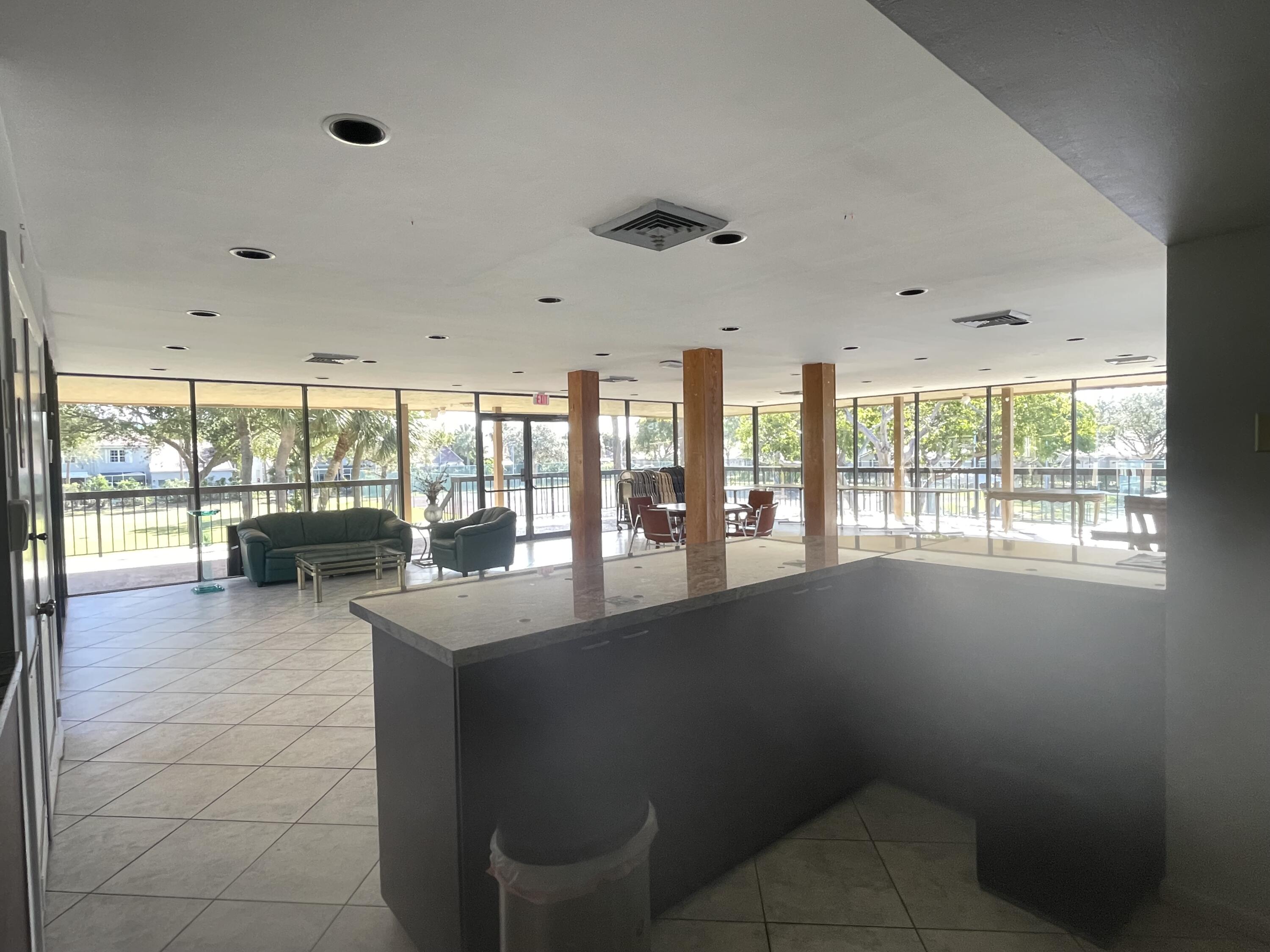 5280 Northwest 2nd Avenue, Unit PH17 Boca Raton, FL 33487 - Photo 33 of 35 33 Clubhouse View From Kitchen