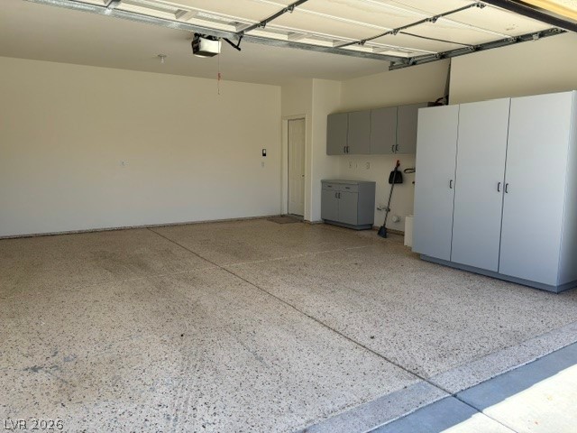 2866 Shimmering Bay Street Laughlin, NV 89029 - Photo 2 of 32 Secure parking and ample storage solutions await in this pristine garage space.