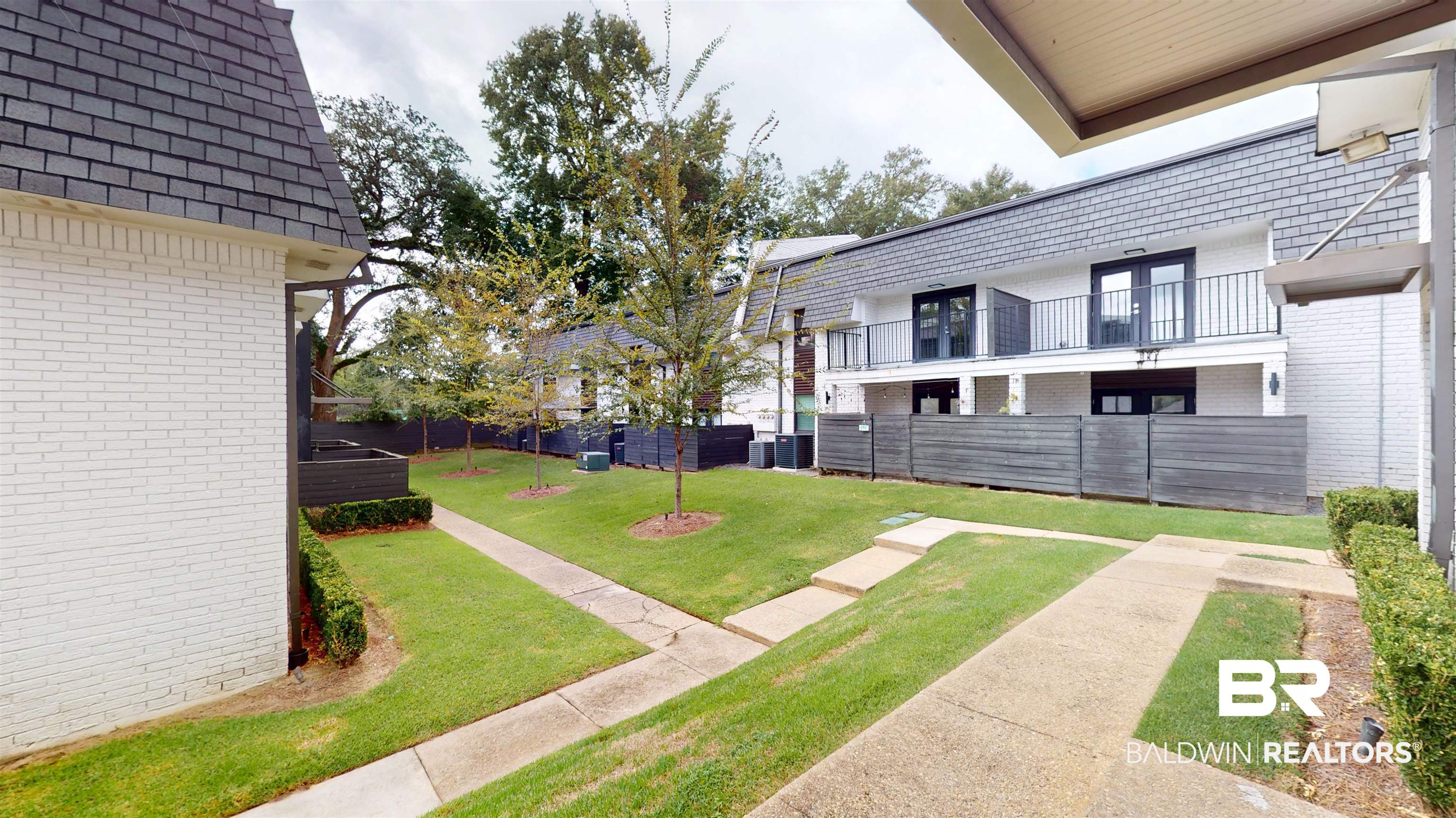 3655 Old Shell Road, Unit 219 Mobile, AL 36608 - Photo 21 of 25 View of yard with a balcony