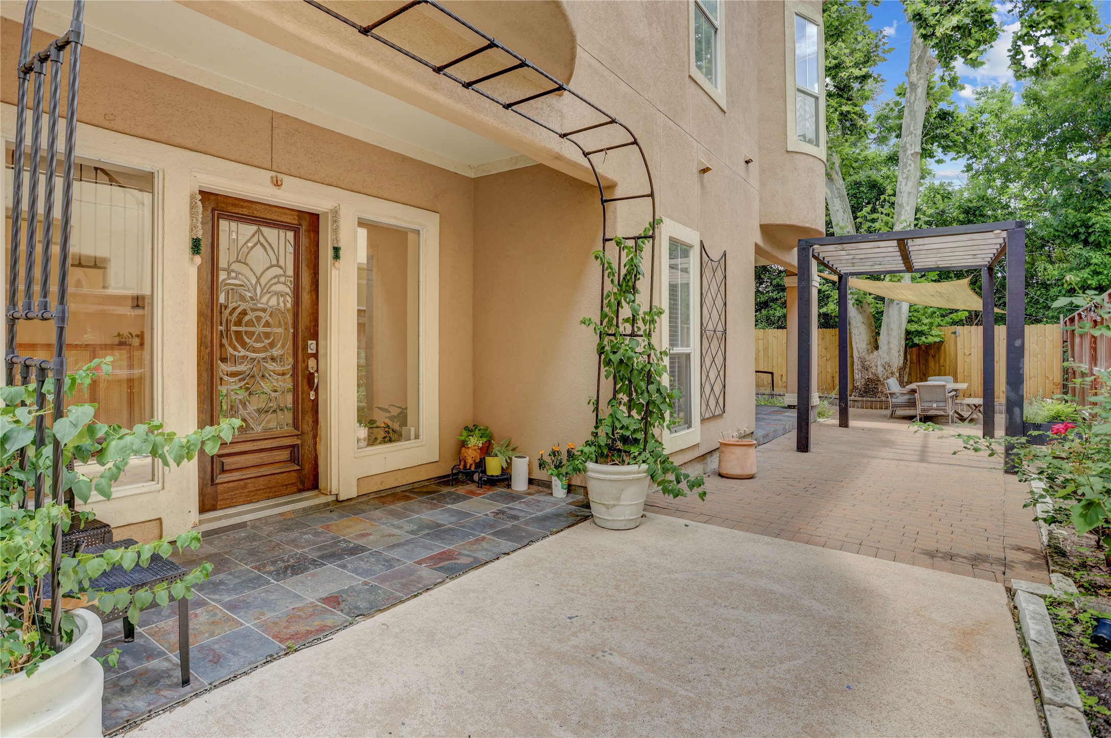 4262 Childress Street, Unit B Houston, TX 77005 - Photo 2 of 22 a view of a garden with patio