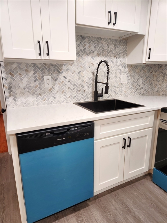 41 Bridgeport Street Worcester, MA 01604 - Photo 21 of 37 a close view of a stove top oven and sink