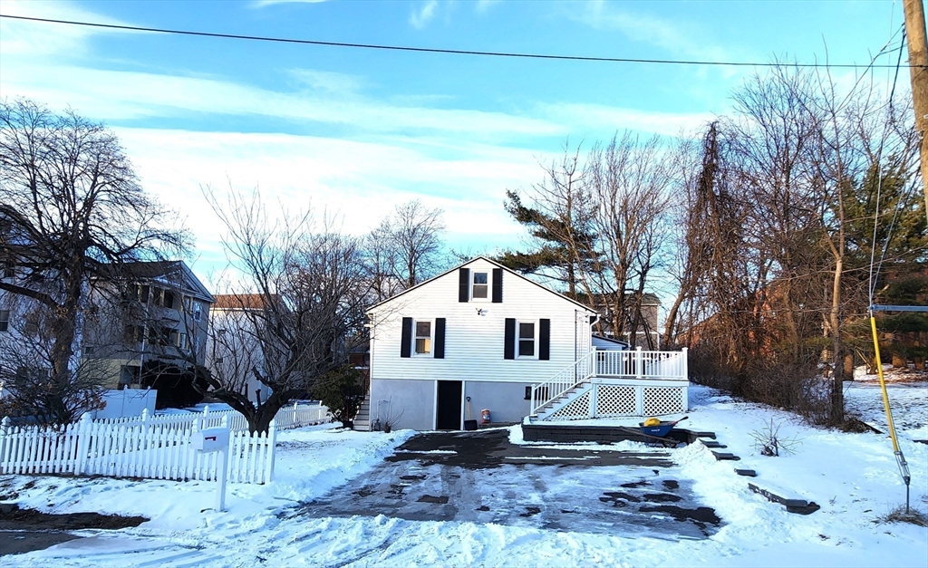 41 Bridgeport Street Worcester, MA 01604 - Photo 3 of 37 a front view of a house with a yard