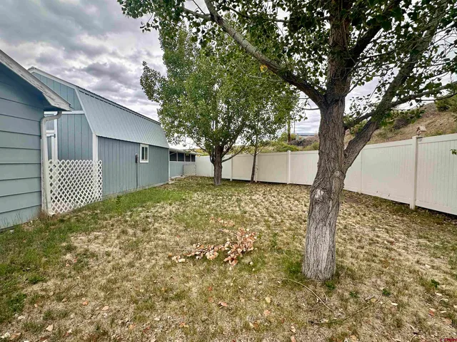 a house with trees in front of it