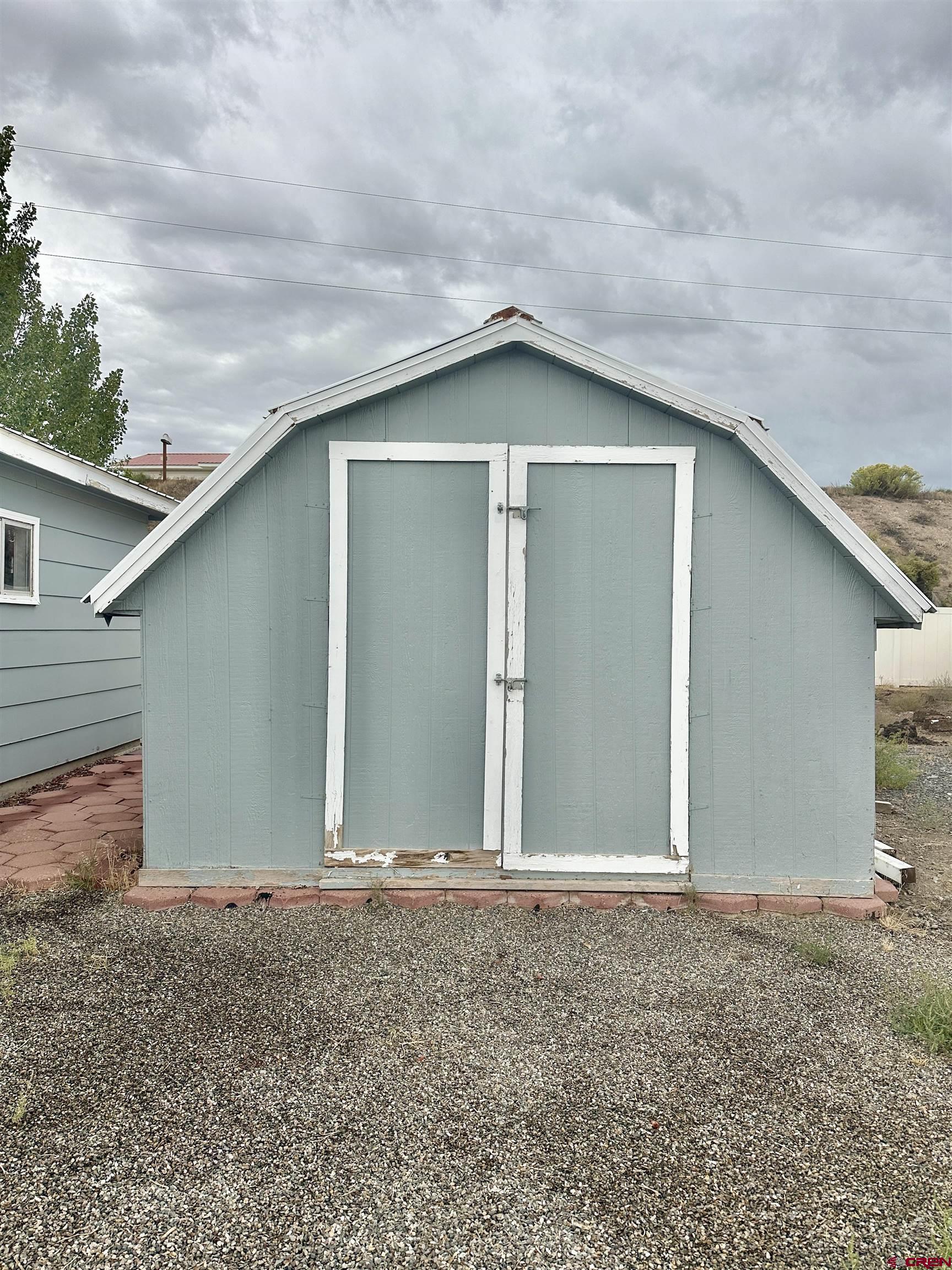 9427 2100th Road Austin, CO 81410 - Photo 37 of 42 a house with a yard