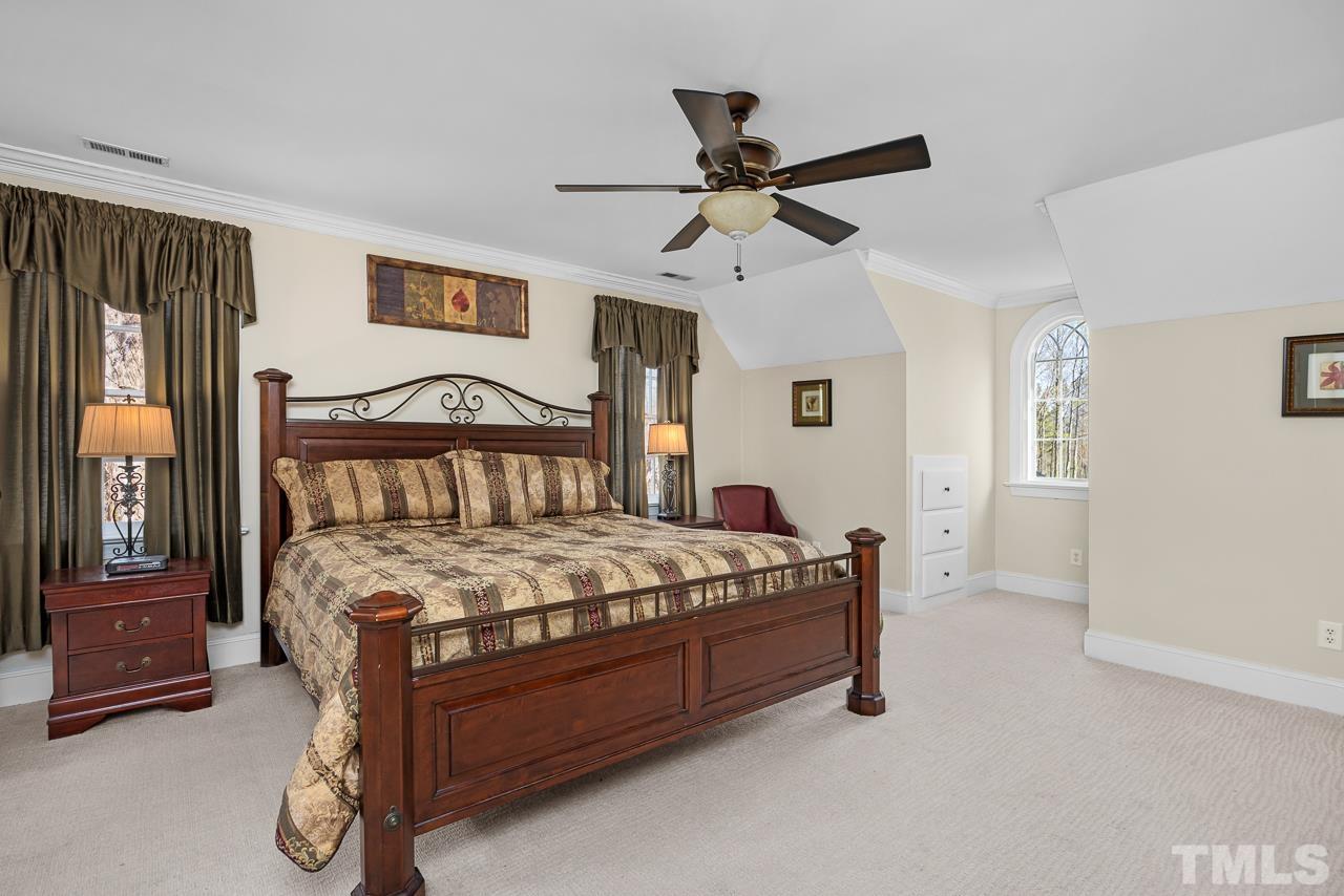 301 Medoc Lane Raleigh, NC 27615 - Photo 17 of 55 a bedroom with a bed and window