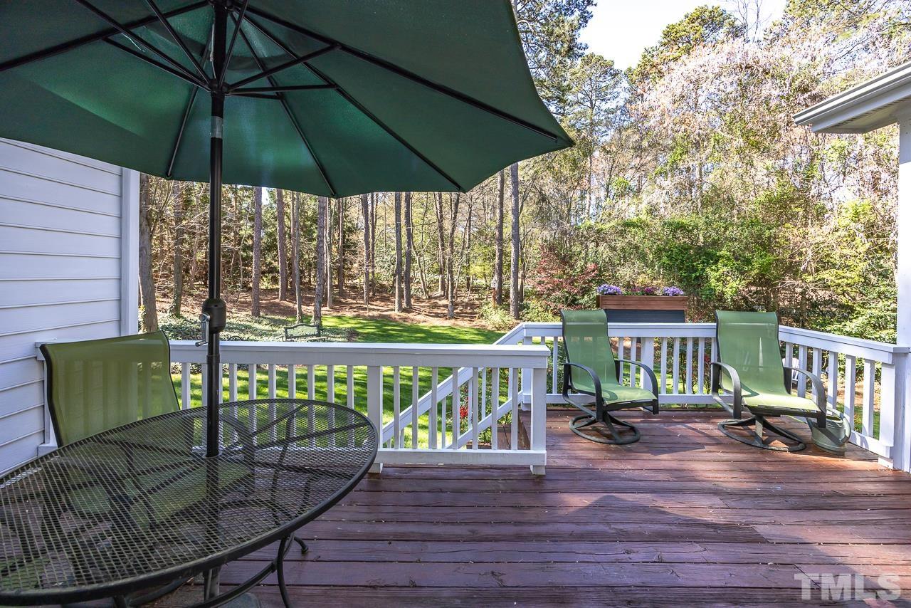 301 Medoc Lane Raleigh, NC 27615 - Photo 28 of 55 a view of a chair and table on the wooden floor