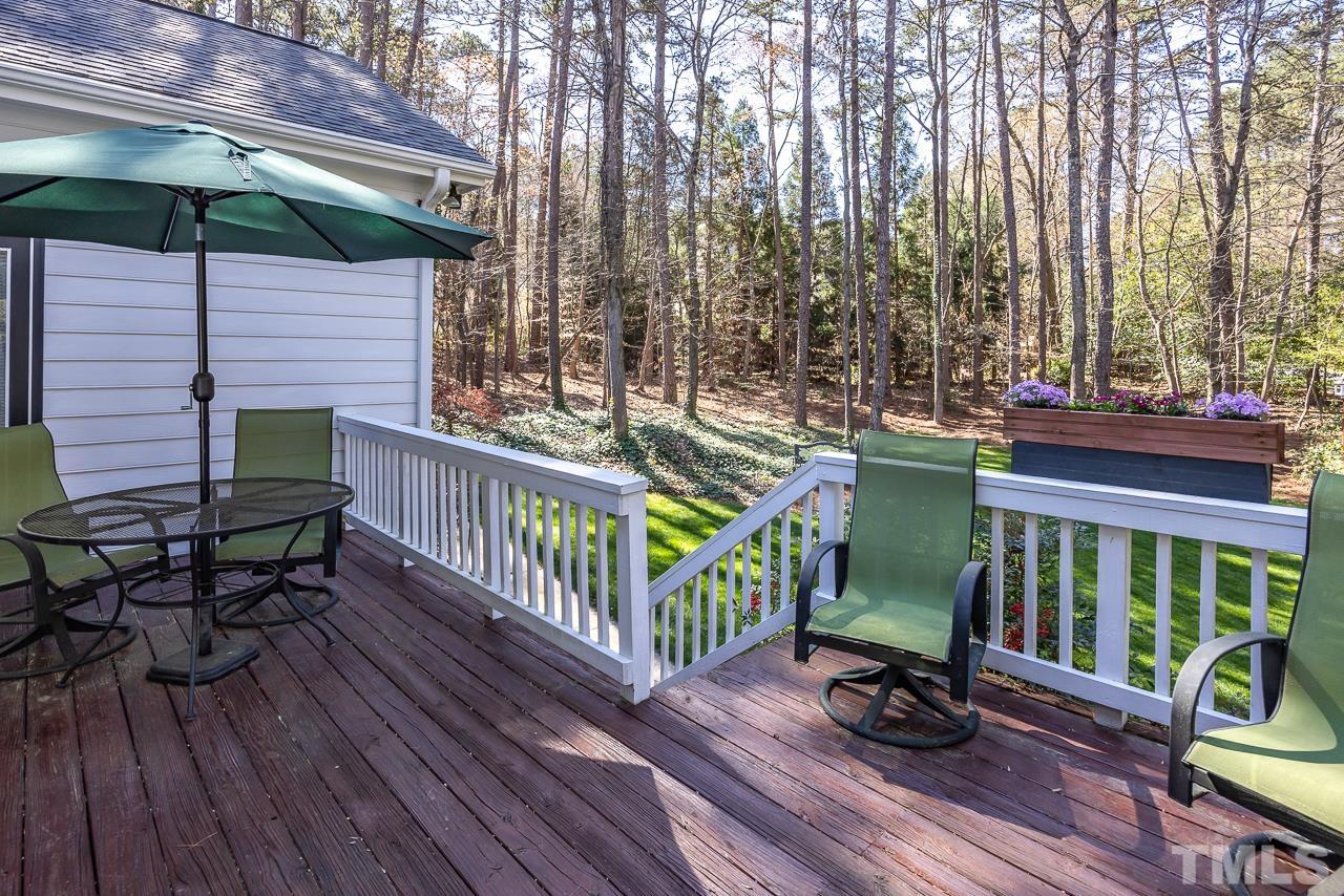 301 Medoc Lane Raleigh, NC 27615 - Photo 29 of 55 a view of balcony with two chairs and wooden floor