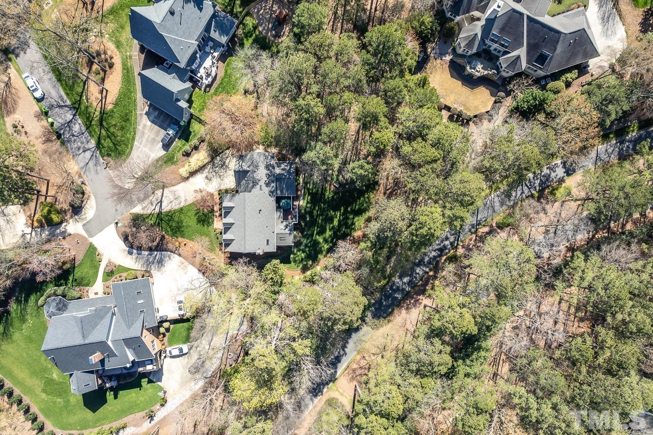 301 Medoc Lane Raleigh, NC 27615 - Photo 46 of 55 an aerial view of a house with a yard