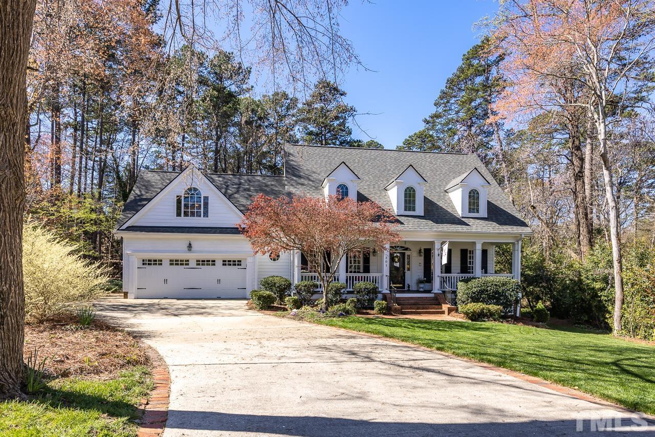 301 Medoc Lane Raleigh, NC 27615 - Photo 52 of 55 a front view of a house with garden