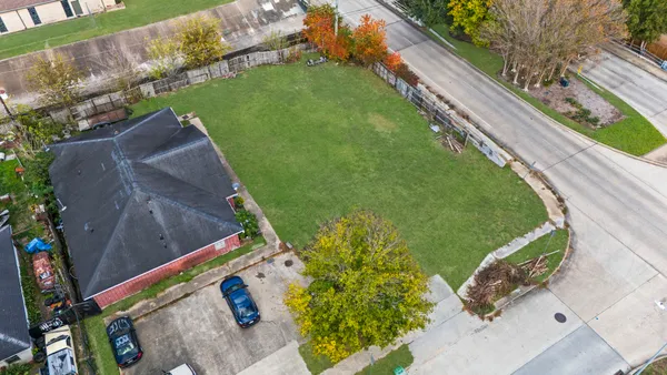 a view of an ocean and a yard